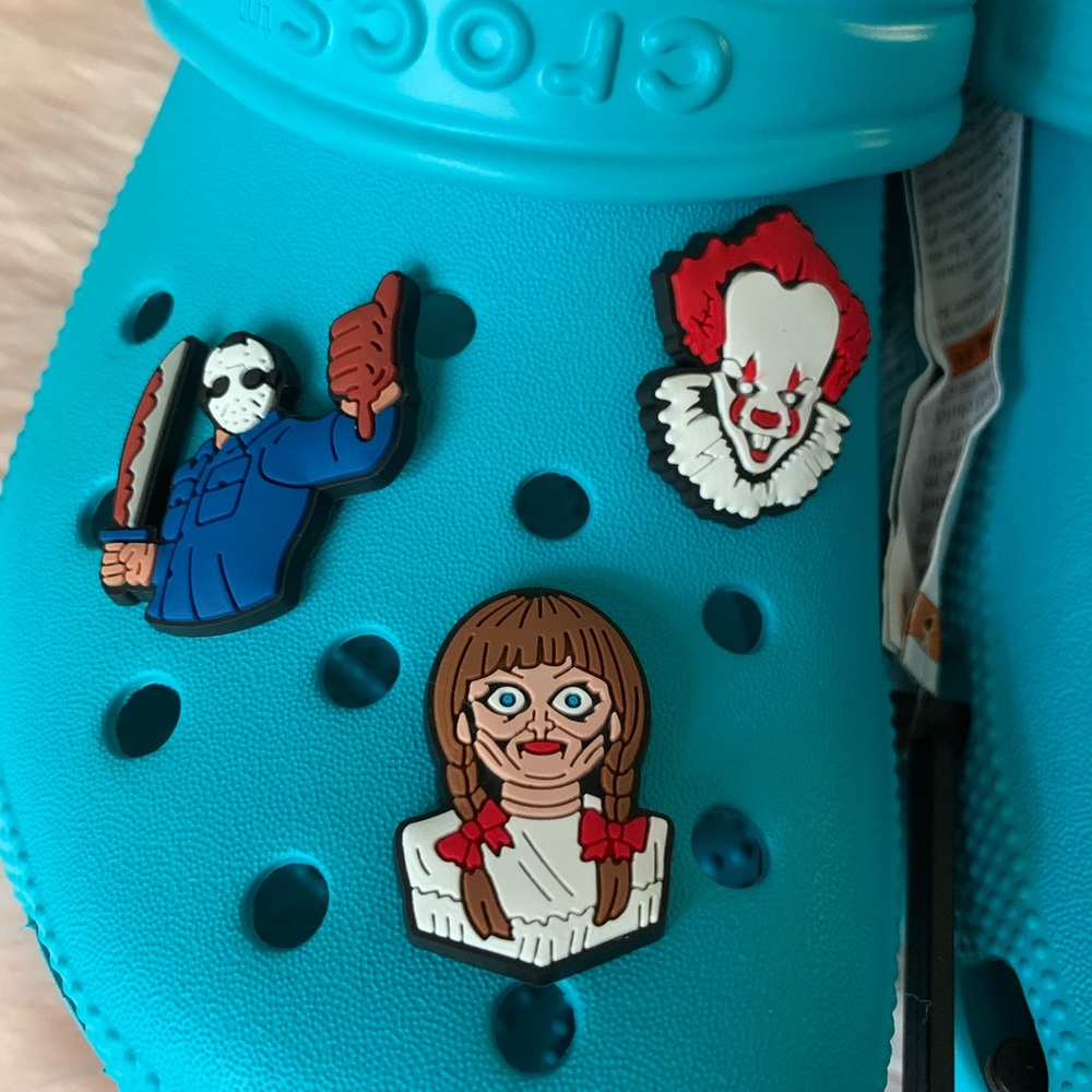 NEW Teal Crocs with Halloween Horror Charms.